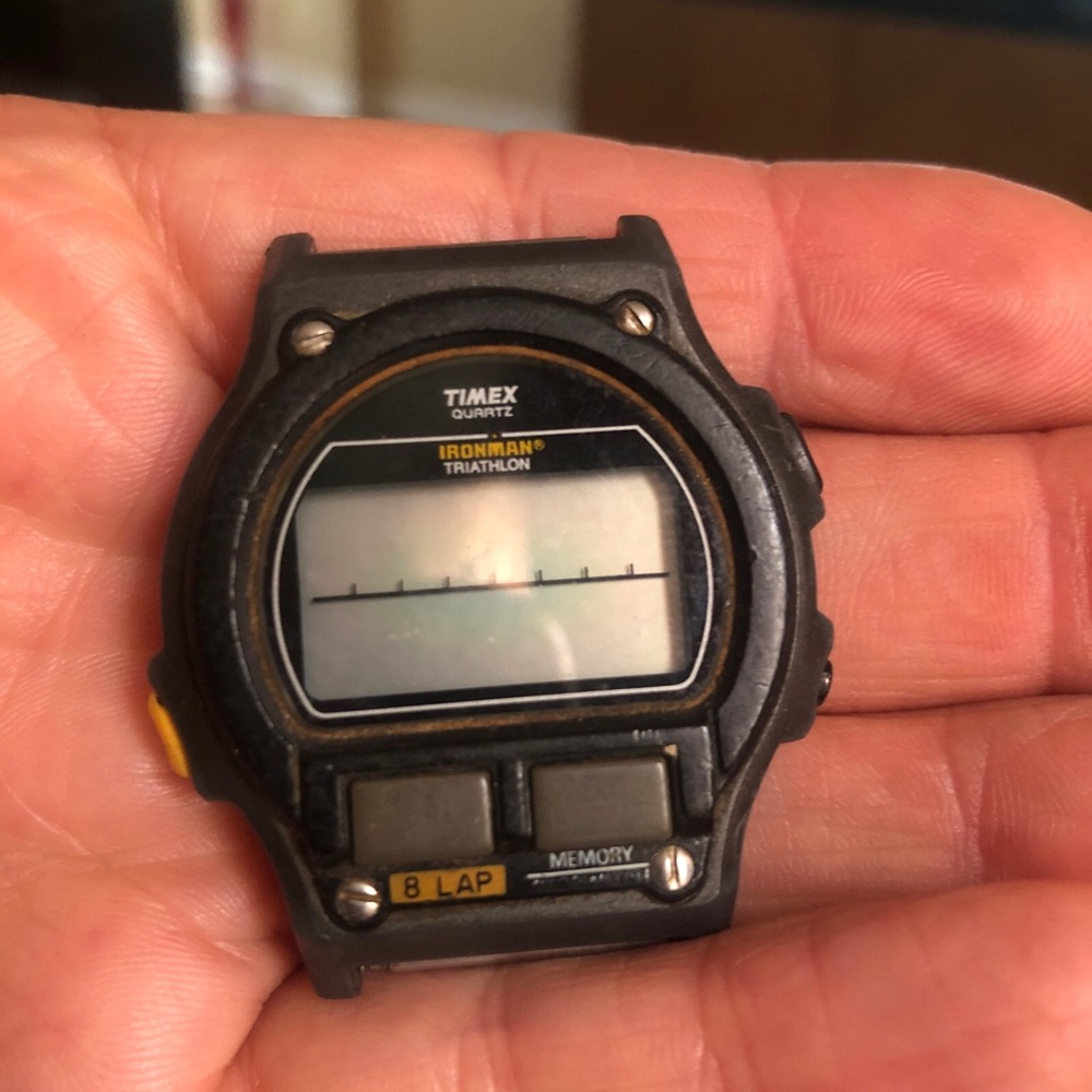 Black Smartwatch With Digital Display And Rugged Design